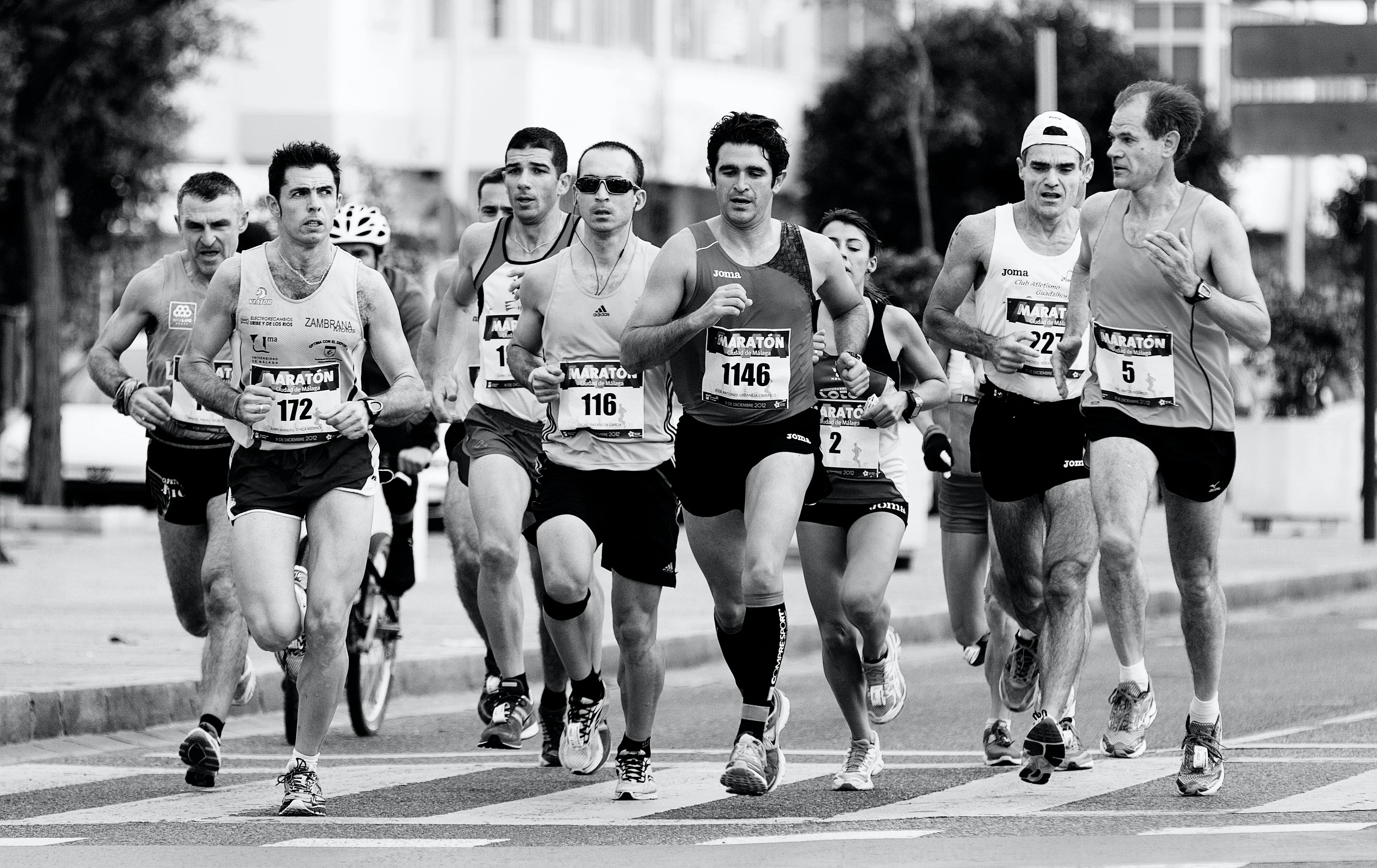 Eye-level view of a running group during a community run